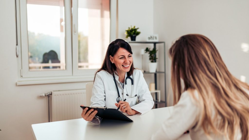 Clinician meeting with a patient in a PHP for substance use disorders