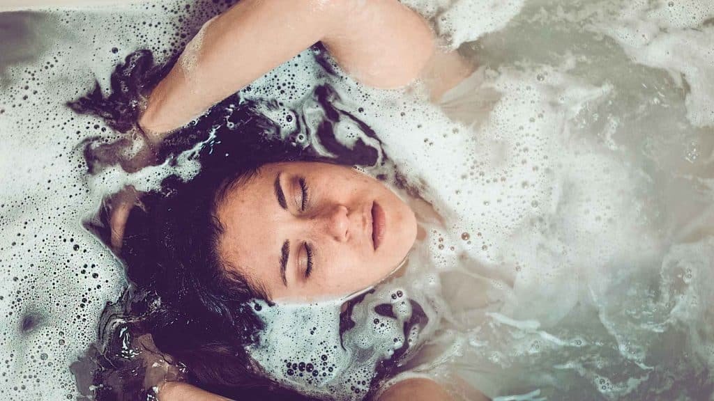 Hot bath providing temporary relief from CHS symptoms