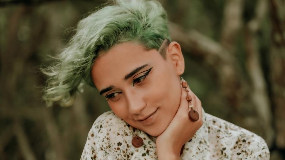 How to Stop Drinking Alcohol Tips, Methods, and Next Steps hero image of woman staring down.