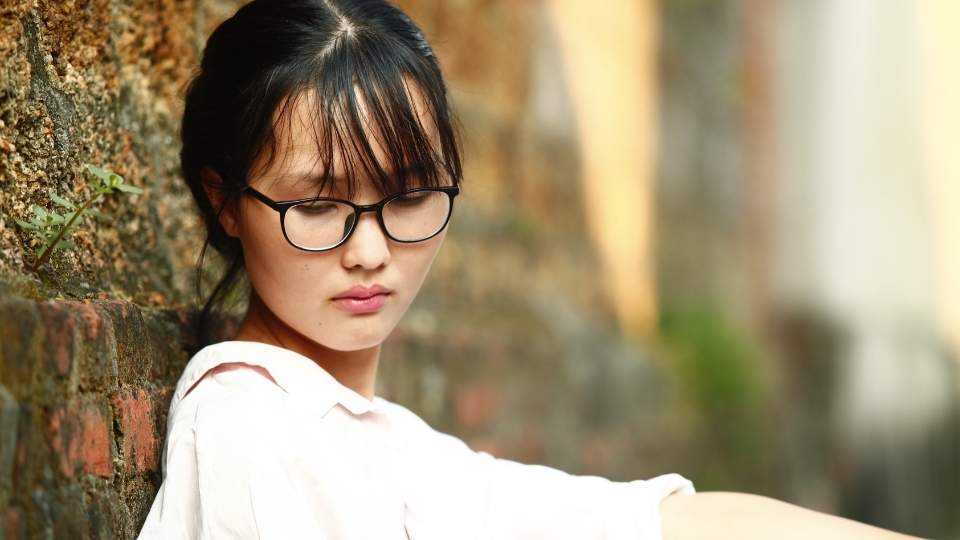 Should I Quit Drinking Alcohol Cold Turkey Risks and Safety Guide hero image of woman outside.