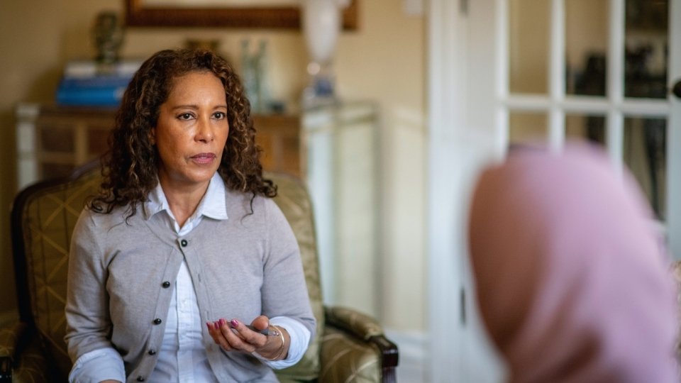 What Is Benzo Belly? two women discuss the difficulty of physical symptoms of withdrawal in therapy.