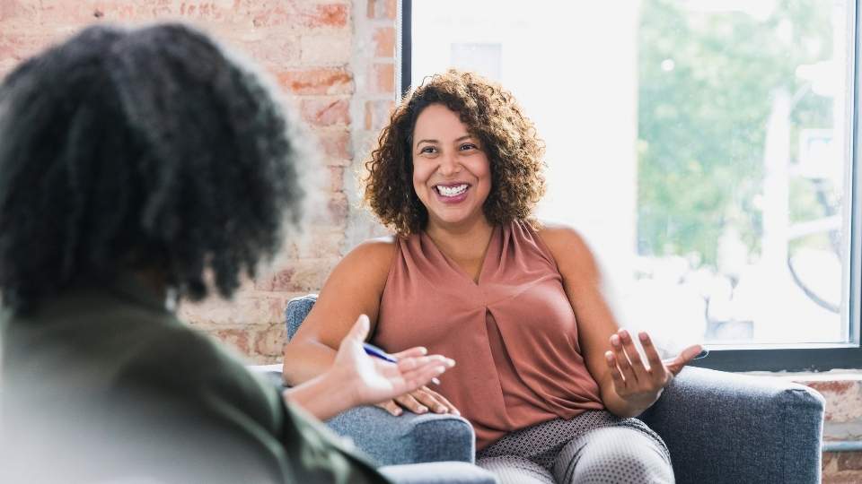 how to stop drinking alcohol two women discuss strategies in therapy.
