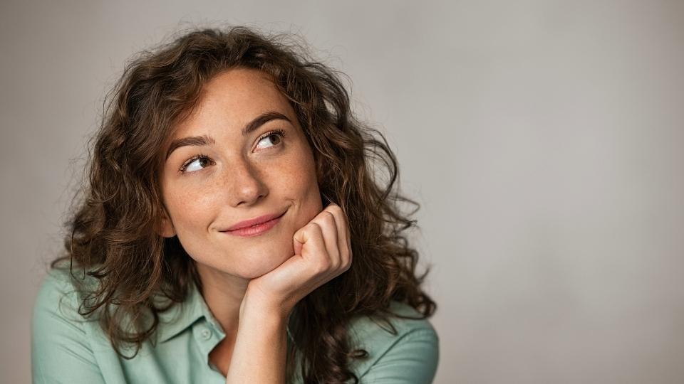 How Long Is Cocaine Rehab a woman thinks about factors that influence length of stay like severity and co-occurring conditions.