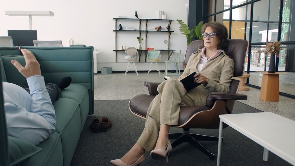 Psychiatrist reviewing a treatment plan with a patient who asked how long does Adderall stay in your system